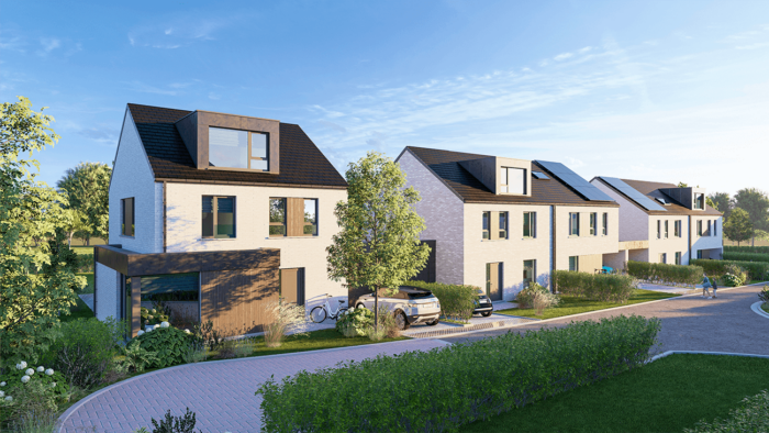 Rangée de maisons modernes blanches à deux étages avec des toits sombres, de grandes fenêtres et de petits jardins à l'avant, situées le long d'une route incurvée avec des voitures garées et de la verdure sous un ciel bleu clair.
