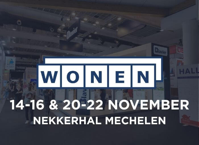 Texte sur l'image : WONEN. Du 14 au 16 et du 20 au 22 novembre. Nekkerhal, Malines. On aperçoit des stands d'exposition et des personnes à l'arrière-plan.